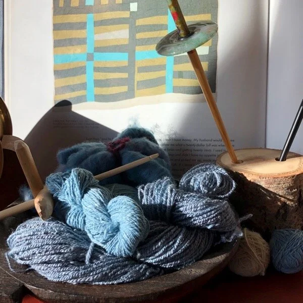 Spindles made by friends, cotton and wool/silk handspun, Gee’s Bend quilts, Indian and US handmade wooden vessels.