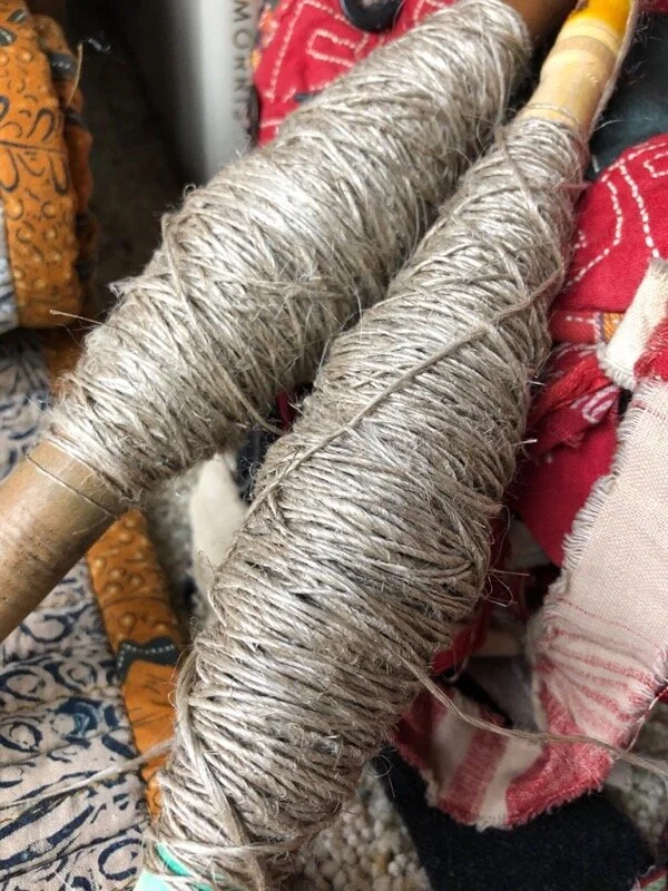 Flax singles on vintage Bugarian spindles….. need more practice with this.