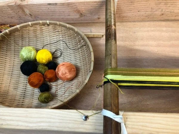 Warping with two-stranded balls of fine cotton from the market in Luang Prabang