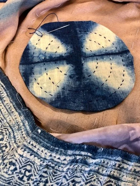 Another sample of Laura Mayotte’s indigo work became a medallion on my shoulder.