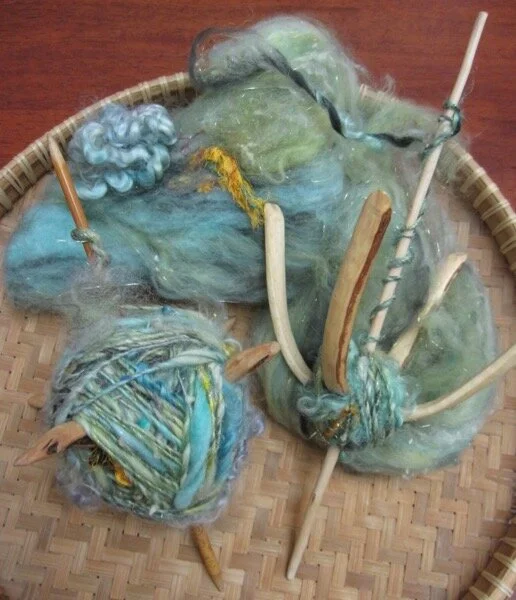 This fiber liked to be stroked. Spindles made by Janet Scanlon (not available, they were unique gifts from a unique and gifted woman.)