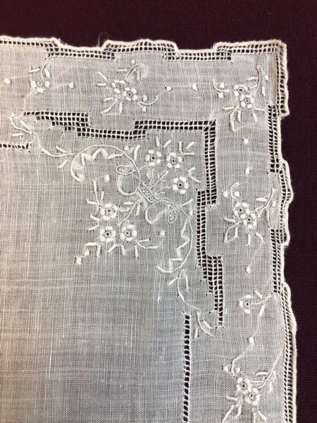 Vintage hankie detail. Whitework and cutwork embroidery and edging. not showing scale, but this is very fine work. The whole thing is only about 9” square.