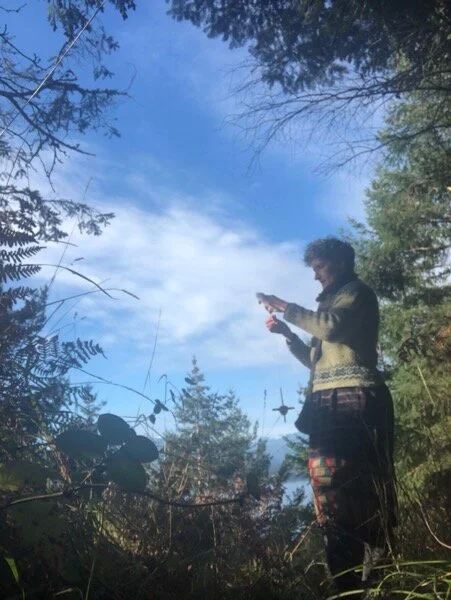 Slug’s eye view of me spinning on the trail the other day. Lots of sky, clouds, trees, me in a skirt made from a Lao handwoven sarong (sinh mukh kho) a handknit sweater, and spinning a little Turkish-style spindle made by Allen Berry.