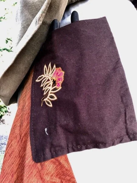 Back hip pocket with secateurs, taken while on my body, so not great. Pocket cloth is brown Thai sarong fabric, same as back of Lichen Duster skirt.