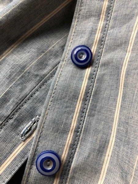 Button band of sewn bodice, with 19th century China buttons in blue and white. These are my first machine sewn buttonholes, ever.