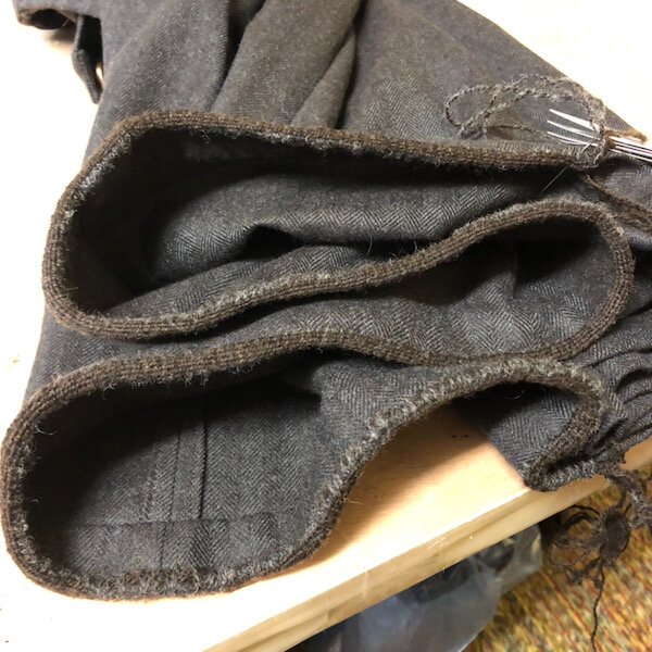 Hem view of nearly finished cardwoven binding.