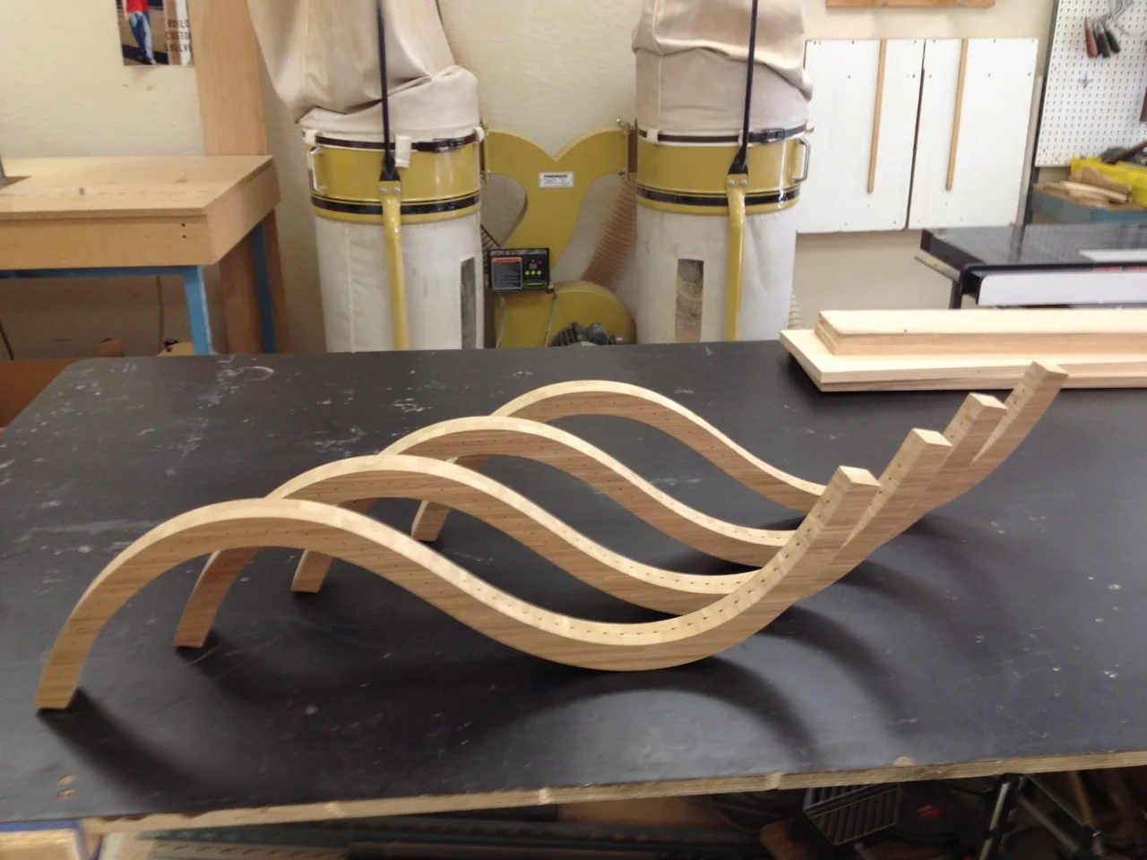 The four curves - removed from the plywood sheet and holes drilled