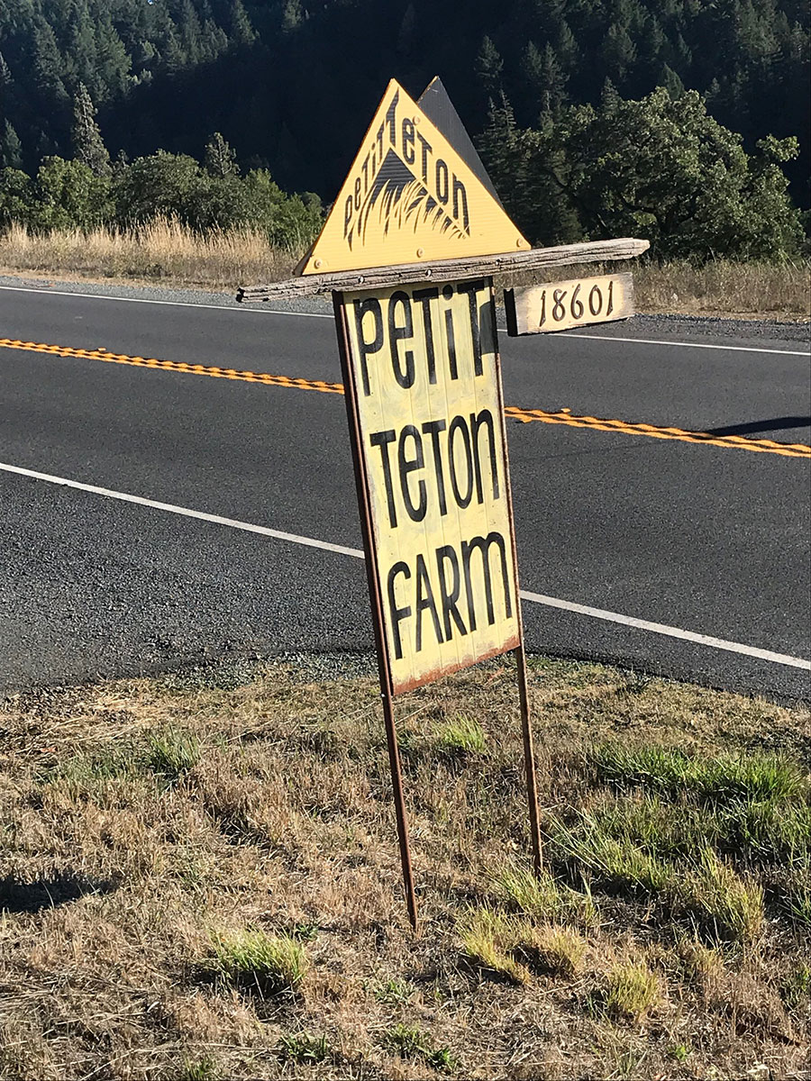 The roadside sign for Petit Teton Farm in Anderson Valley