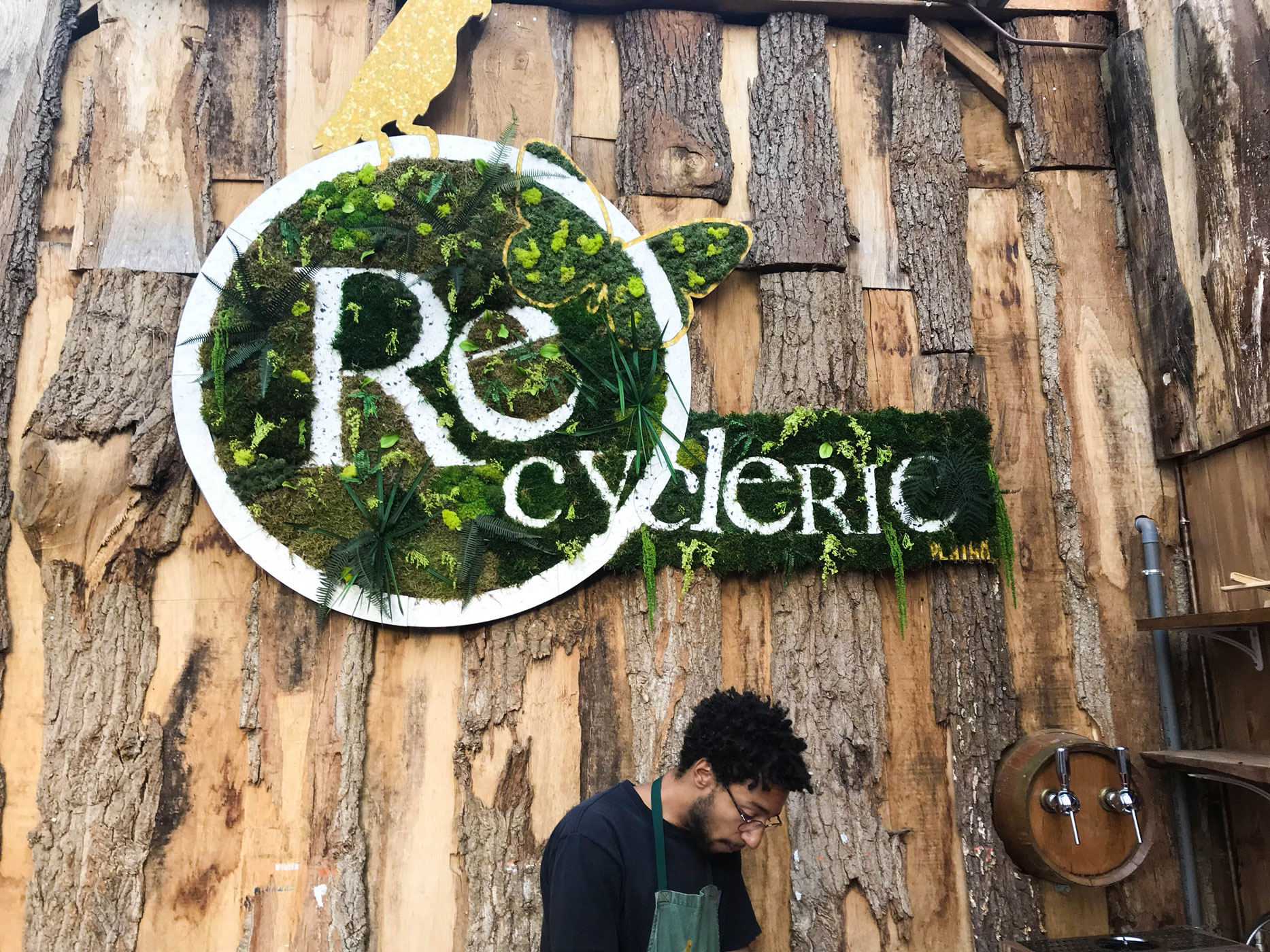 beautiful sign created by plants at Le REcyclery in Paris