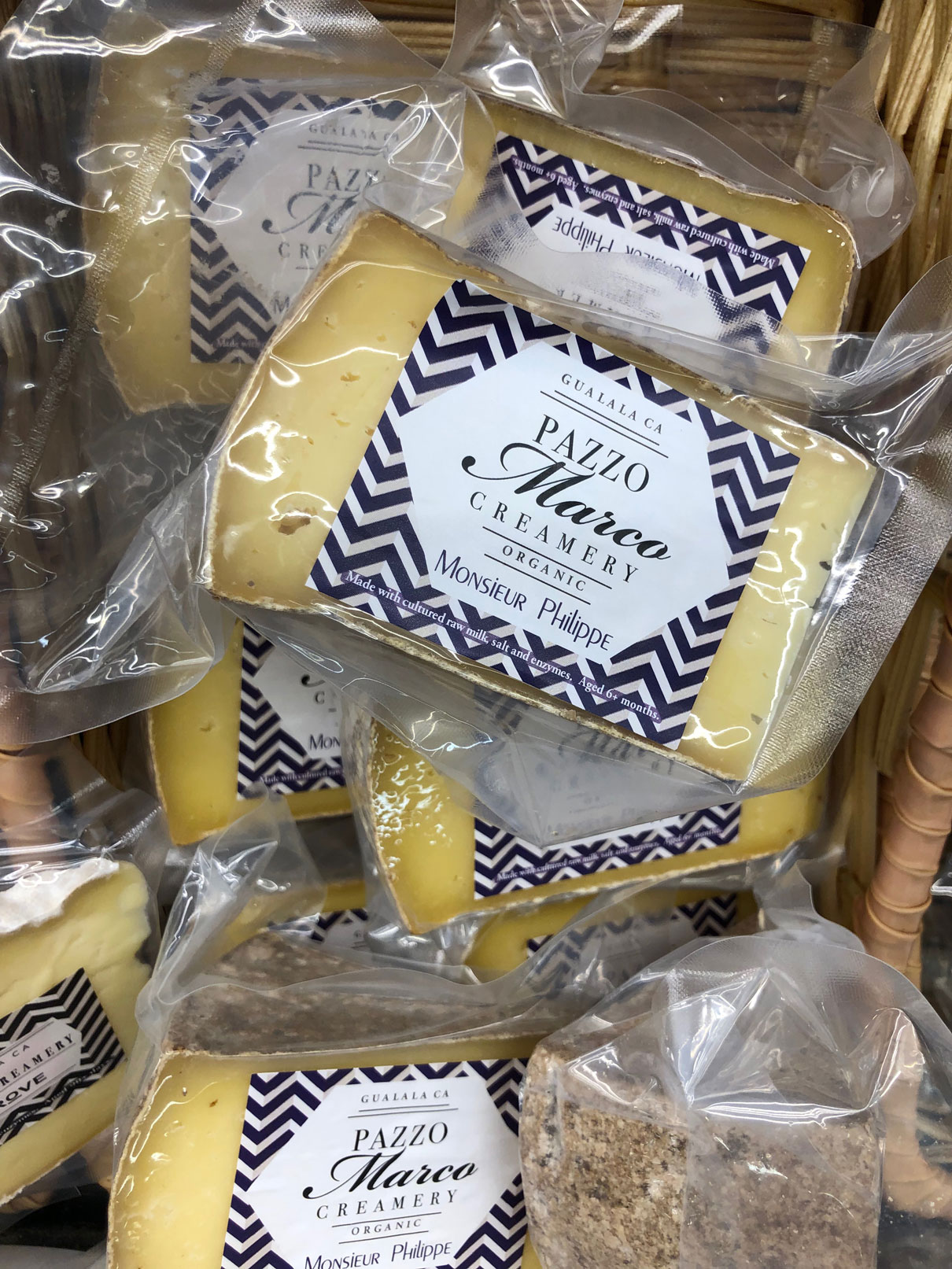 packages of Pazzo Marco cheese
