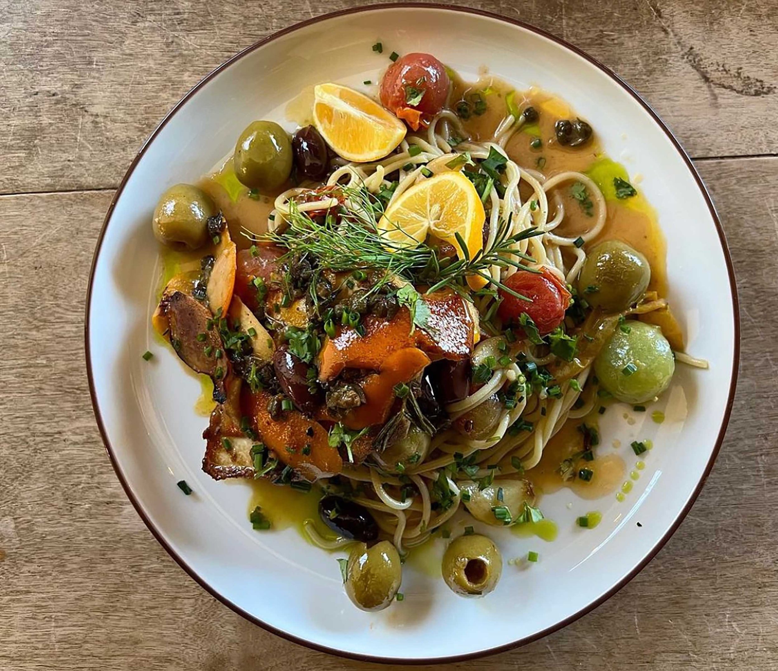 Pasta with local halibut, olives, and orange