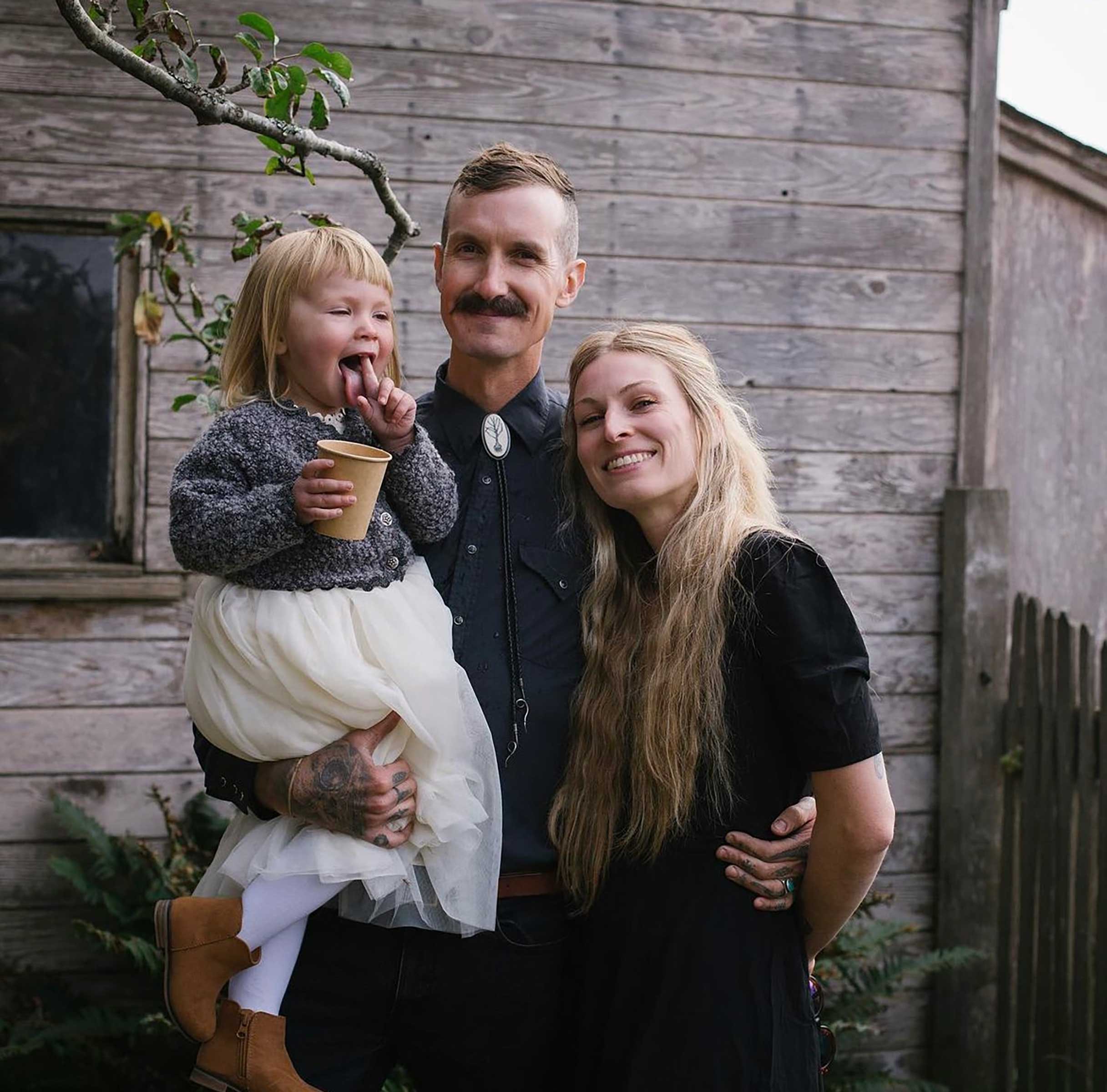 Kyle &amp; Mel with their daughter