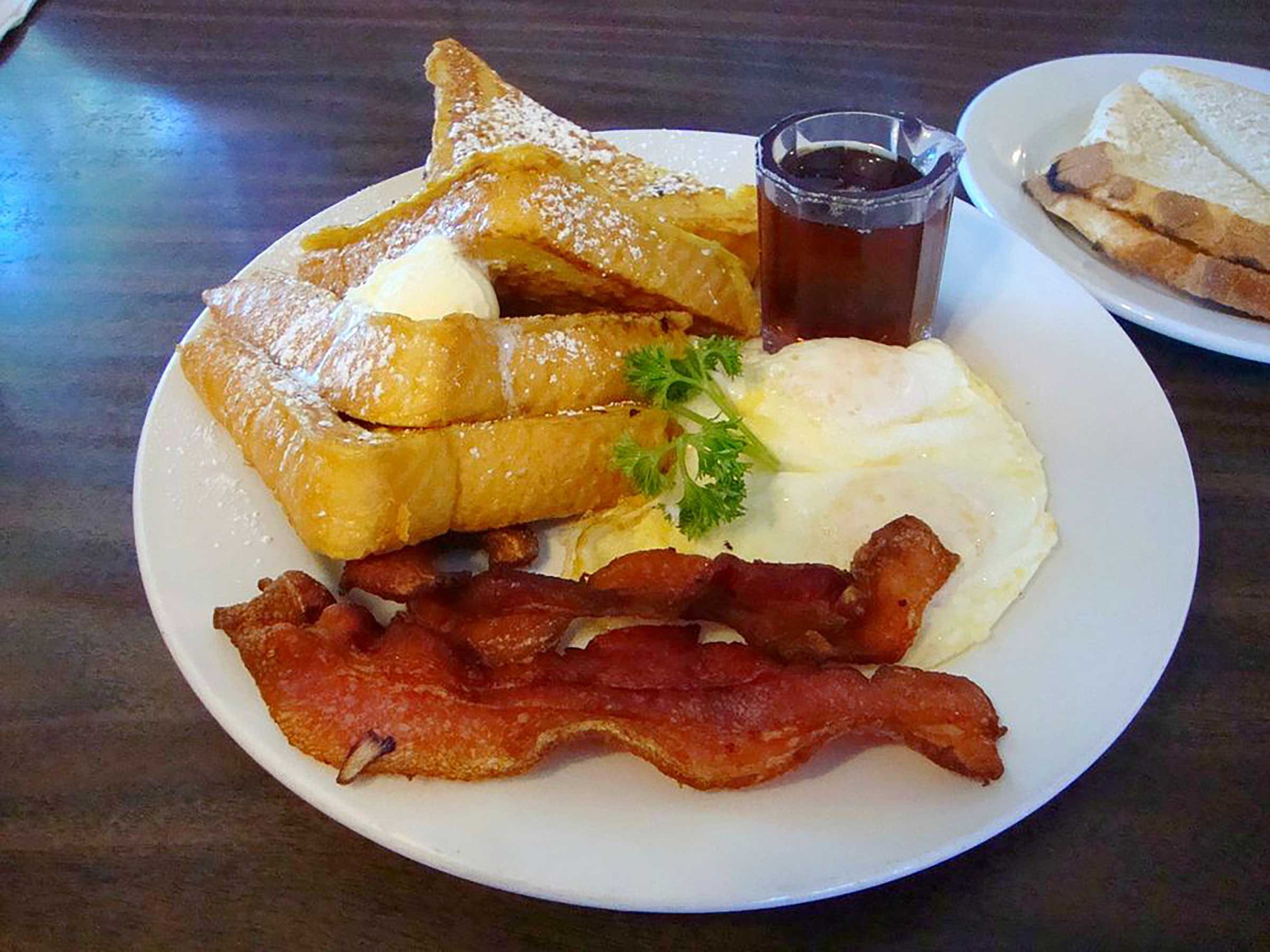 French toast with fried egg and bacon