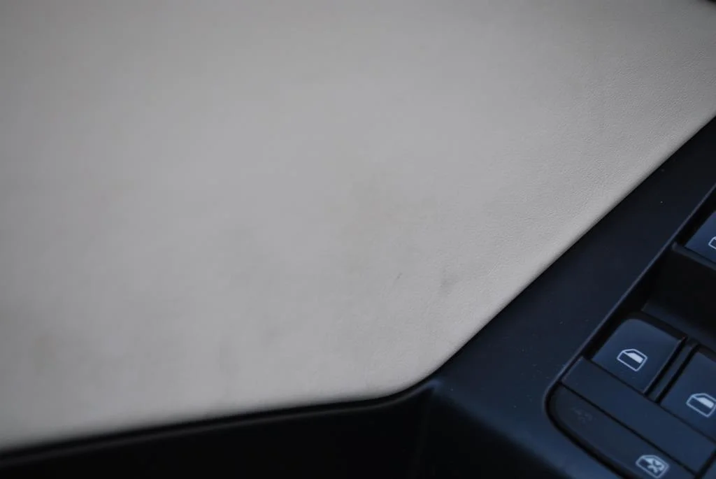Dirt spots on leather insert.