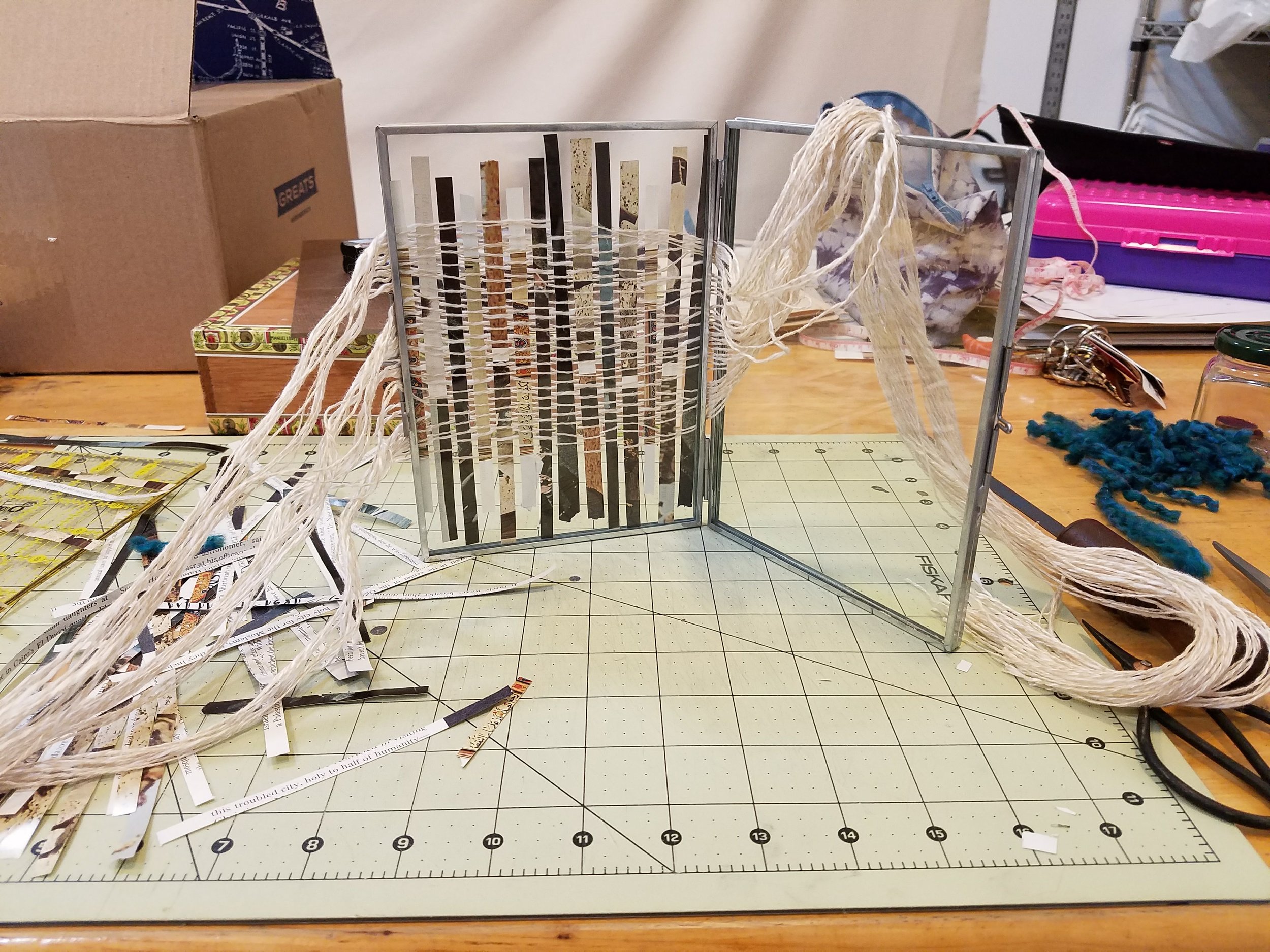 Smaller piece I completed with the same warp I used in River , but with magazine pages from a National Geographic I had.