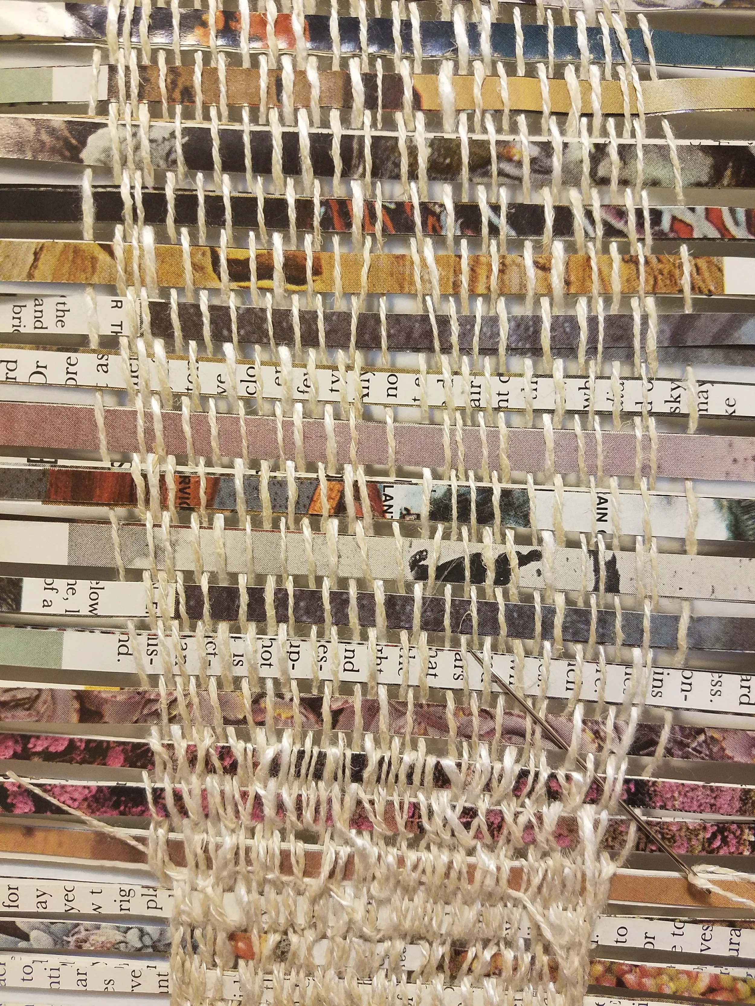 Detail shot of the further handwork I did after I wove the pages together. When I was starting to weave this piece together, there was a lot of political and emotional unrest regarding Syrian refugees and other immigrants from the Middle East. This, I believe, became fuel for me to finish the weaving.