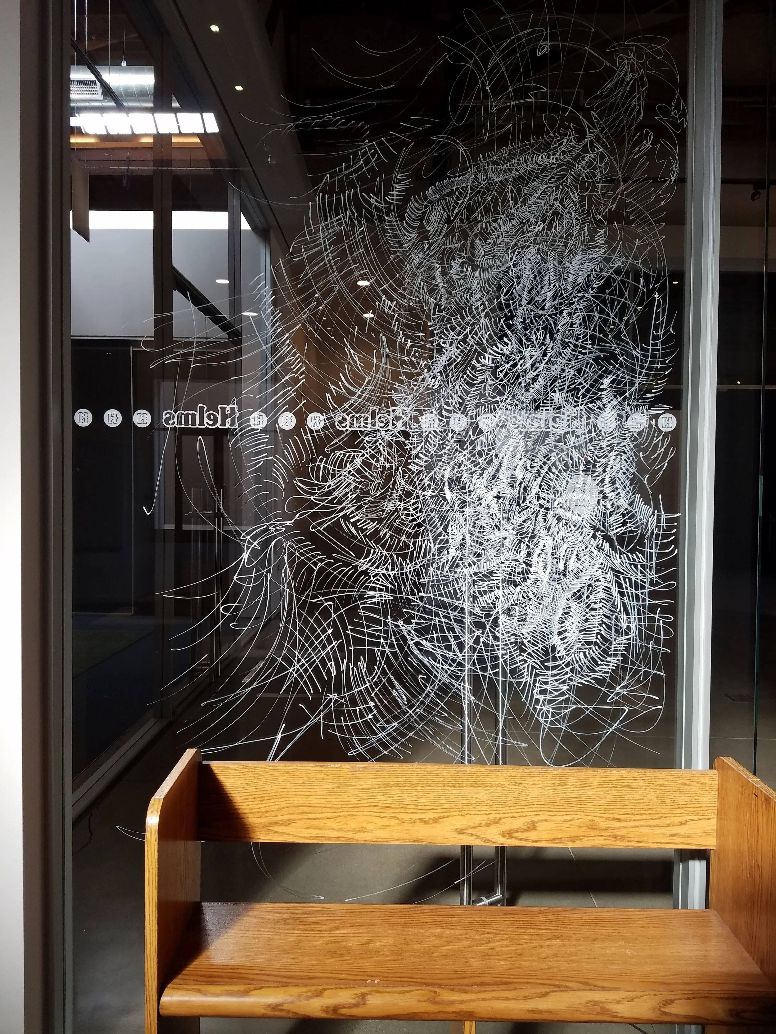Glass drawing using water soluble chalk paint pen.