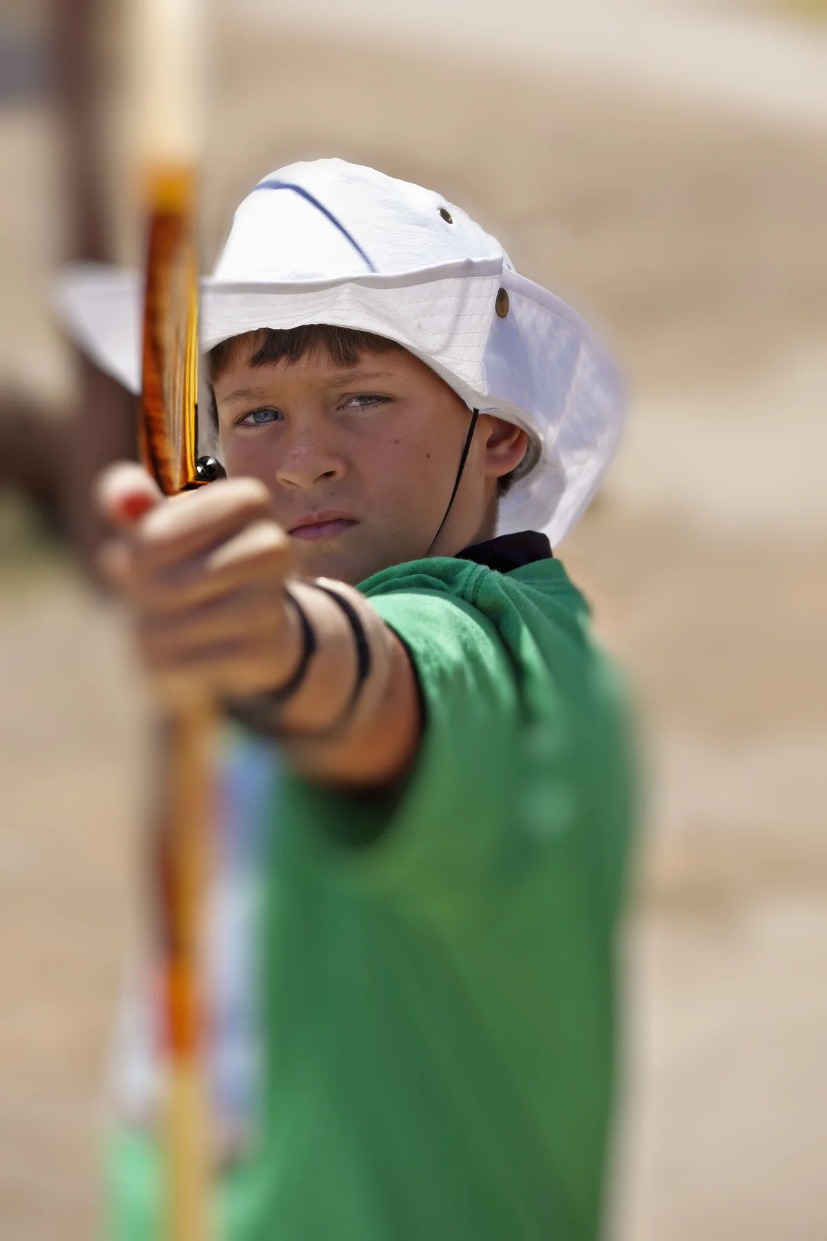 Conner shoots bow at me 2.jpg