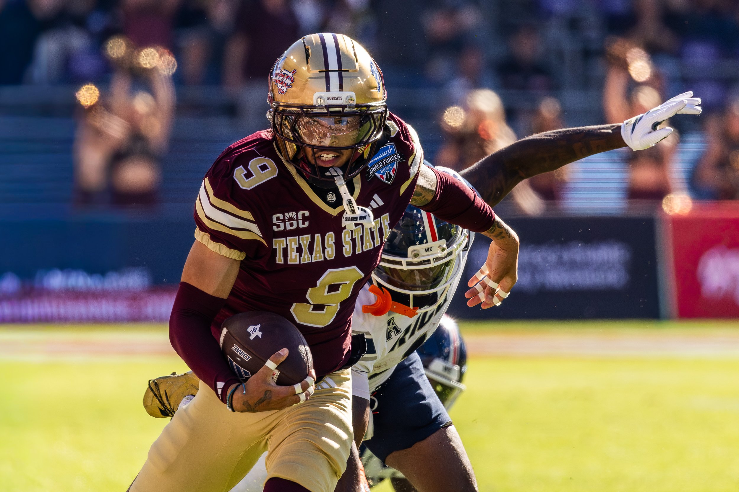 TEXAS STATE BOBCATS cornerback JADEN RIOS (9) with an interception during the Lockheed Martin Armed Forces Bowl between the Rice Owls and Texas State Bobcats at Gerald J. Ford Stadium.