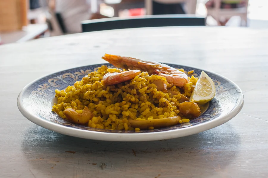 A plate of seafood paella. Usually it is served in a big carbon steel pan for multiple people. We actually make it every Sunday for the hostel guests at 360.