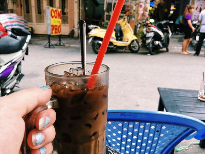 Ca phe sua da (extra strong coffee mixed with sweetened condensed milk) ...and some chipped nail polish left over from NYE