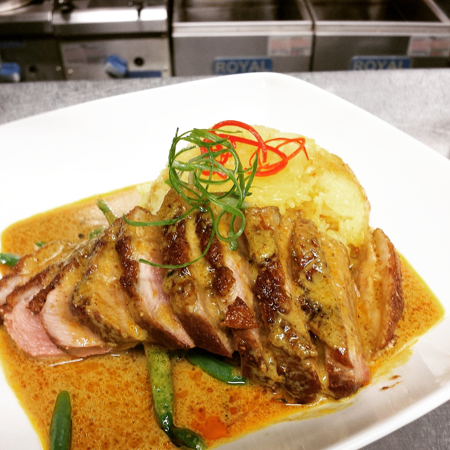 Itik Kunyit Seared duck breast, tumeric scented sticky rice, green beans, duck curry. Follow us on instagram @soostoronto for more great #mmmalay photos!