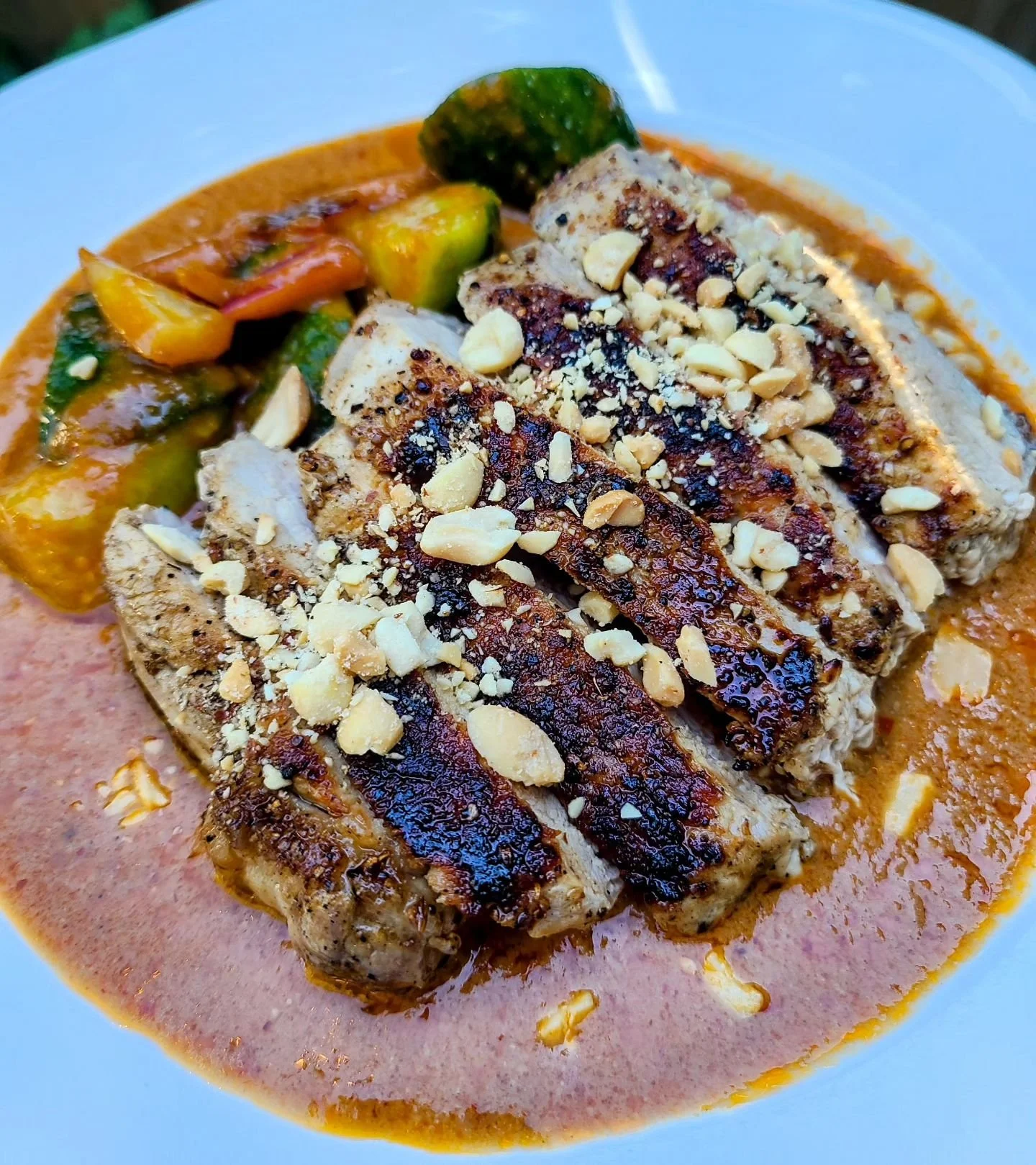 'Satay Babi' - classic satay inspired pork chop, acar acar pickles, peanut sauce. Now on the summer menu!

#sataybabi
#satay
#mmmalay 
#nyonya
#soos
#soostoronto
#reimagining 
#malaysian 
#streetfood 
#malaysianfood
#ossington
#summer
#patio
#feedme
