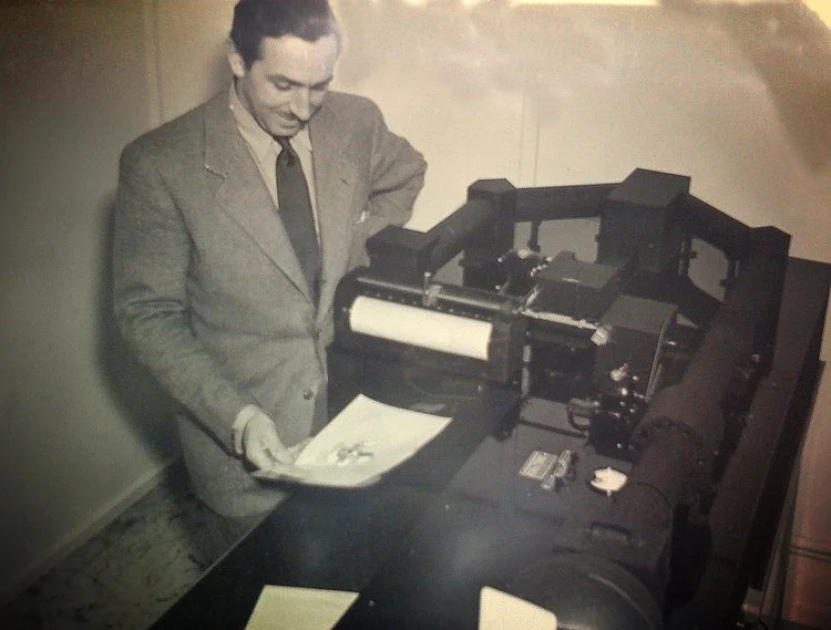Walt Disney with an early model of the Xerox processor.