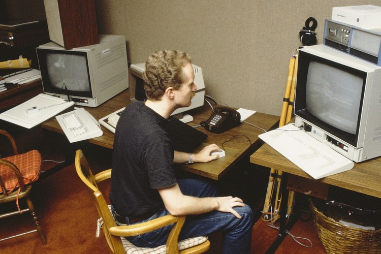 Craig at work in the graphics room at LFL in the 1980s. "I don't remember the occasion," he said, "but this was way before the Pixar Image Computer existed as hardware. The room is ... where, among other things, the Genesis Effect, 'The Adventures of André & Wally B.' and the stained glass knight from 'Young Sherlock Holmes' were produced." © Pixar Animation Studios. All rights reserved.