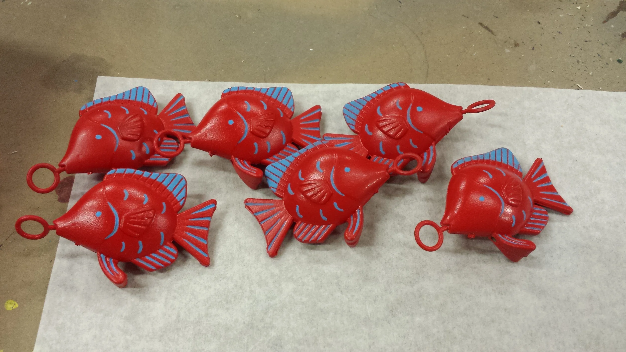 Painted the blue details on multiple toy fish to ensure continuity on screen. (Playdate 2015)