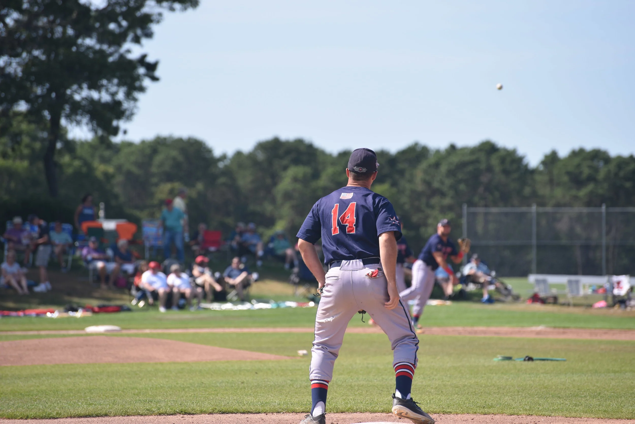 Harwich players warm up pre game. Photo by Harrison Meyers.