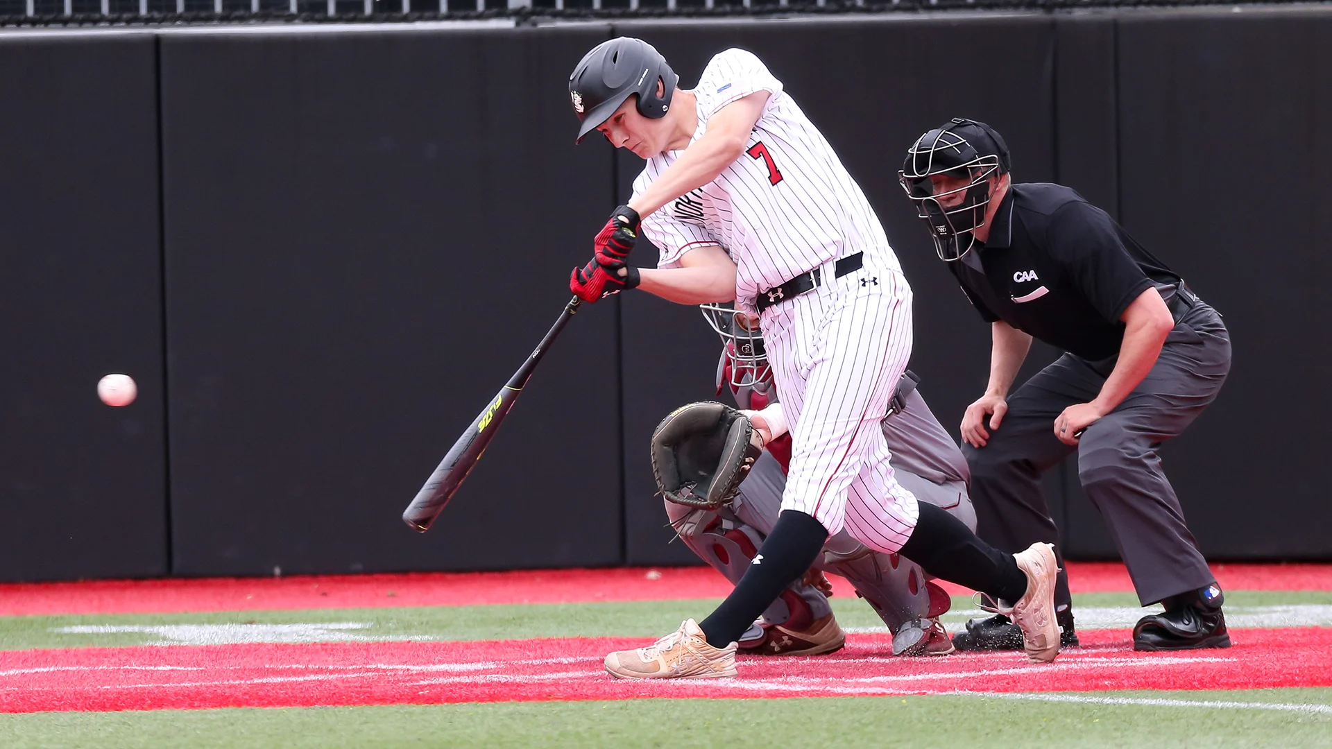 Ian Fair batting for the Northeastern Huskies. Photo courtesy of Northeastern Athletics.