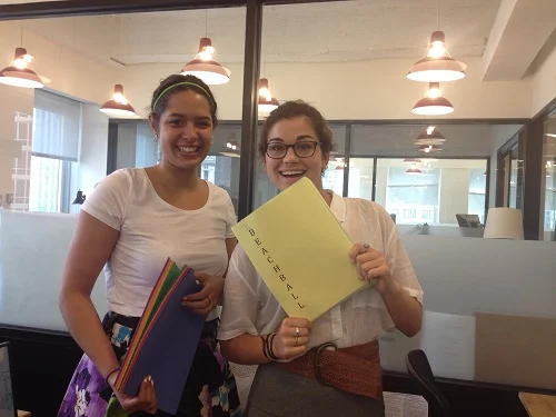 Here I am (on the left) with my fellow Research & Development Intern, Isabelle! We're in the middle of planning a summer LitFest at the Polo Grounds Community Center in Harlem!