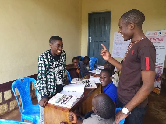 All smiles with mentor Herman and the boys during the weekly Check-in Question.