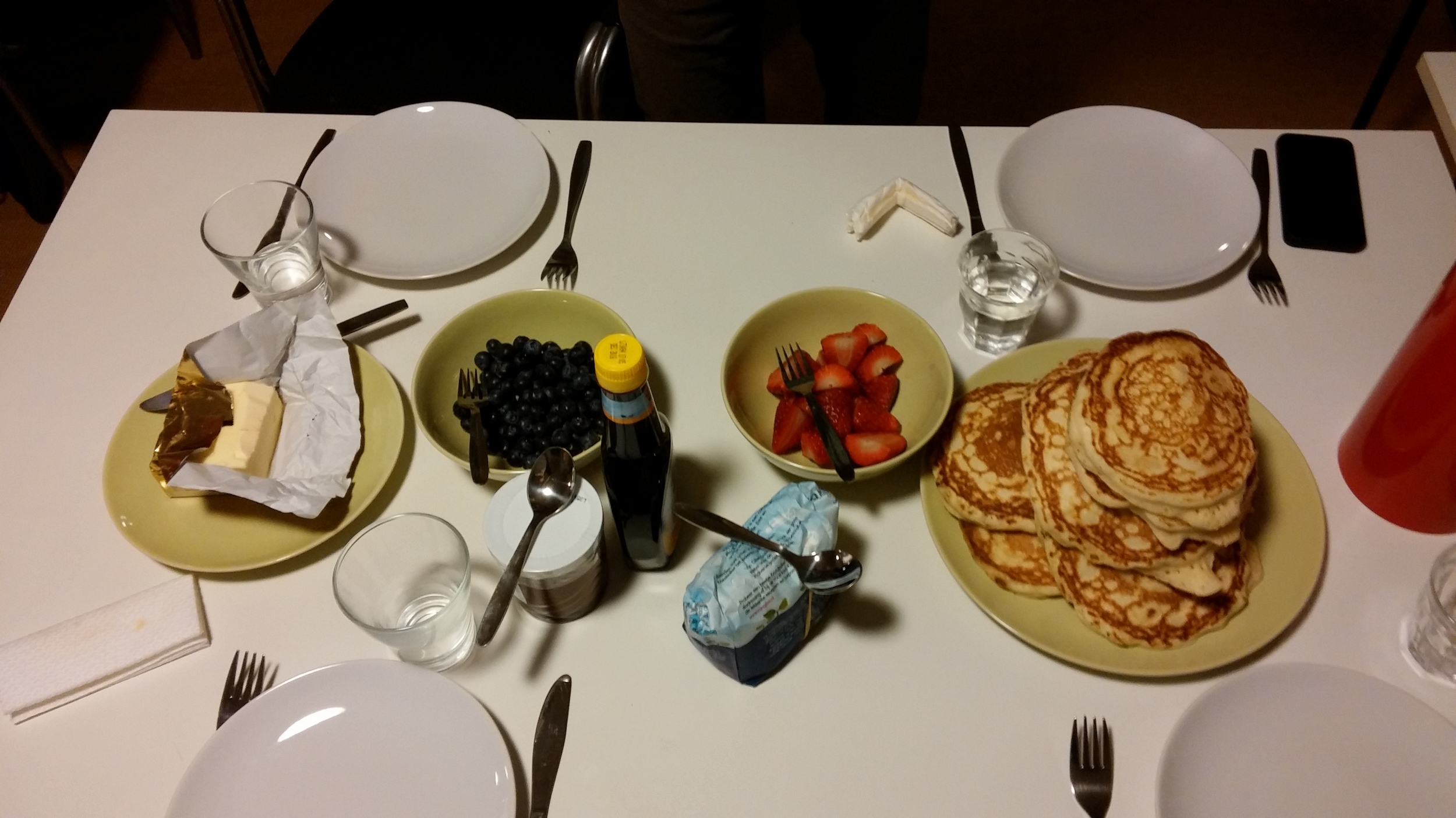 Served with butter, blueberries, strawberries, sugar, syrup, and nutella.