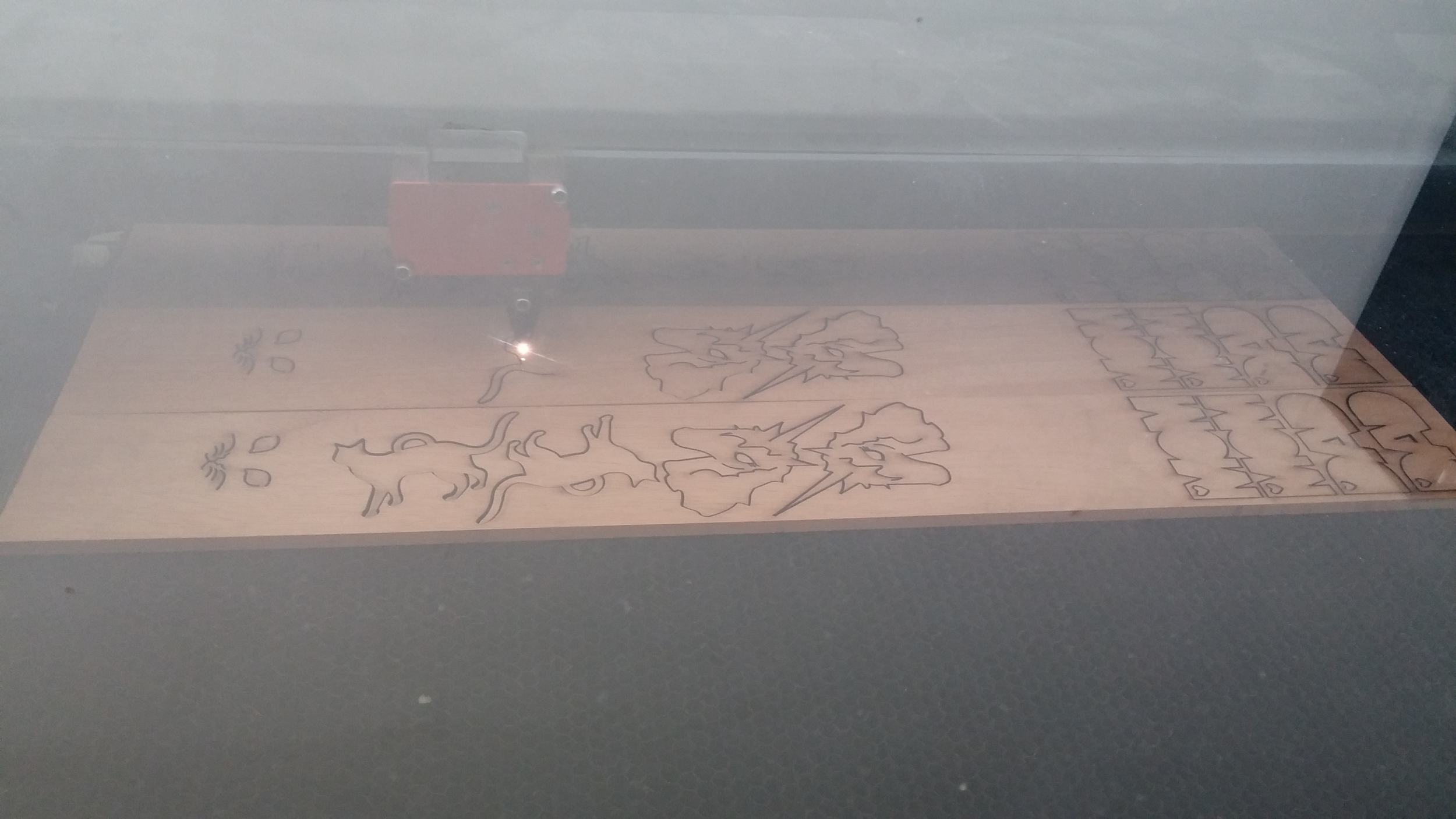 Laser cutting some keychains