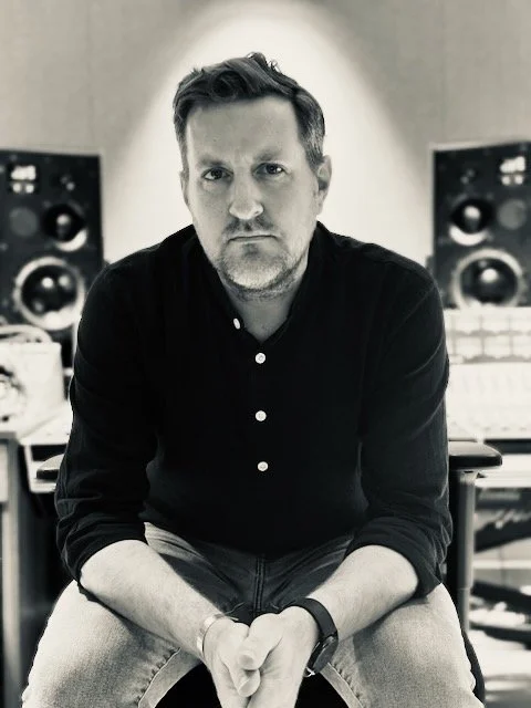 Jason Reif, Bethlehem PA music producer, headshot in his recording studio