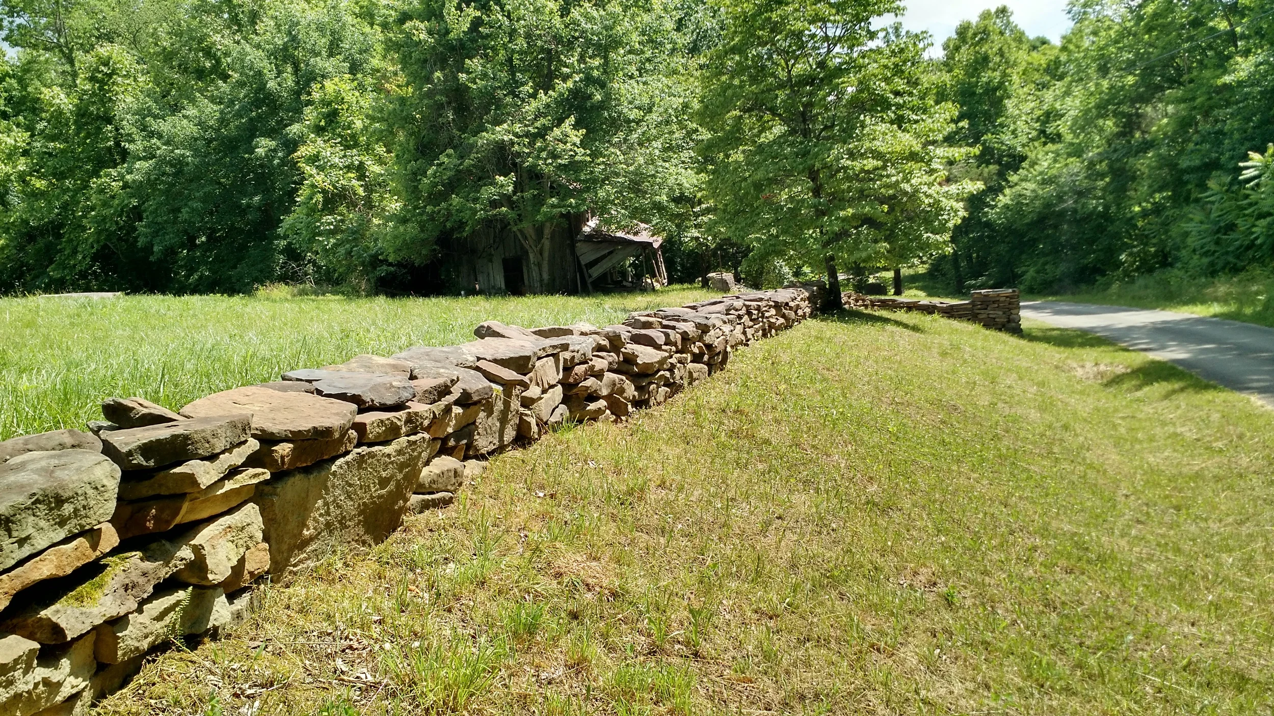 Rock Wall on Bear Hollow Road. The original Highland Freewill Baptist Church building stood on Bear Hollow Road; it burned in the 1970's.