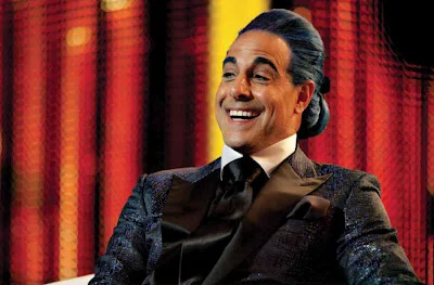 Caesar-Flickerman-the-hunger-games-movie-29037865-900-592.jpeg