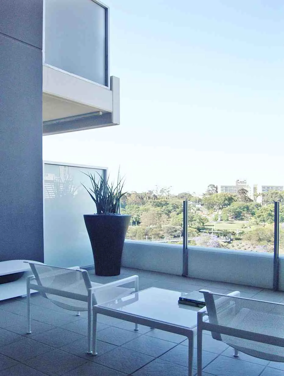 modern apartment interiors showcasing open-plan living rooms, dining spaces, bedrooms, and balconies with contemporary decor and natural light.