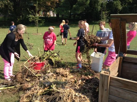 Ravenscroft middle school students visit Alliance monthly for garden workdays.