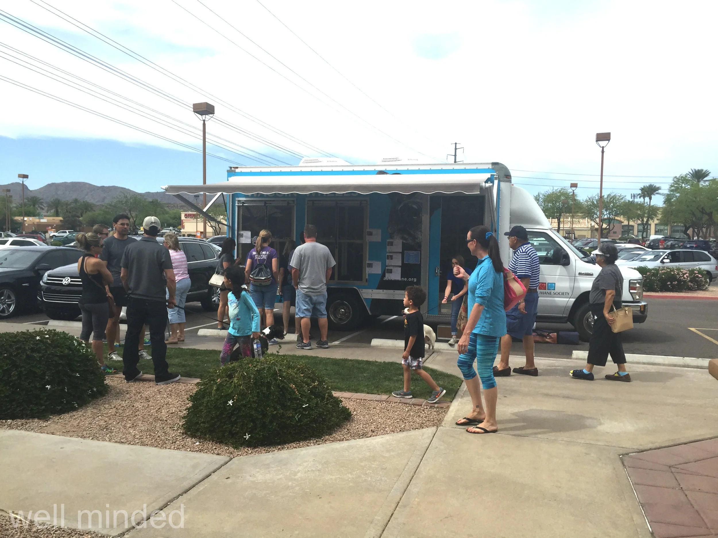 The crowd gathered outside the Waggin' Wheels Wagon.