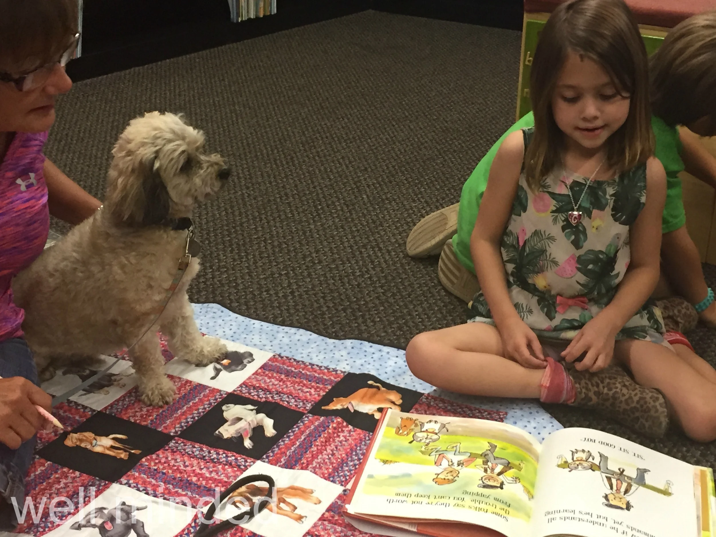 Zach is patient while Campbell reads. 