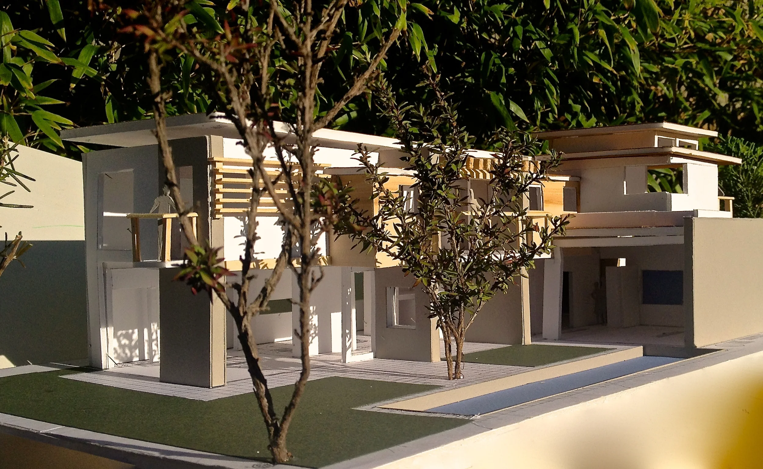 Rear yard view of family & Living facing pool