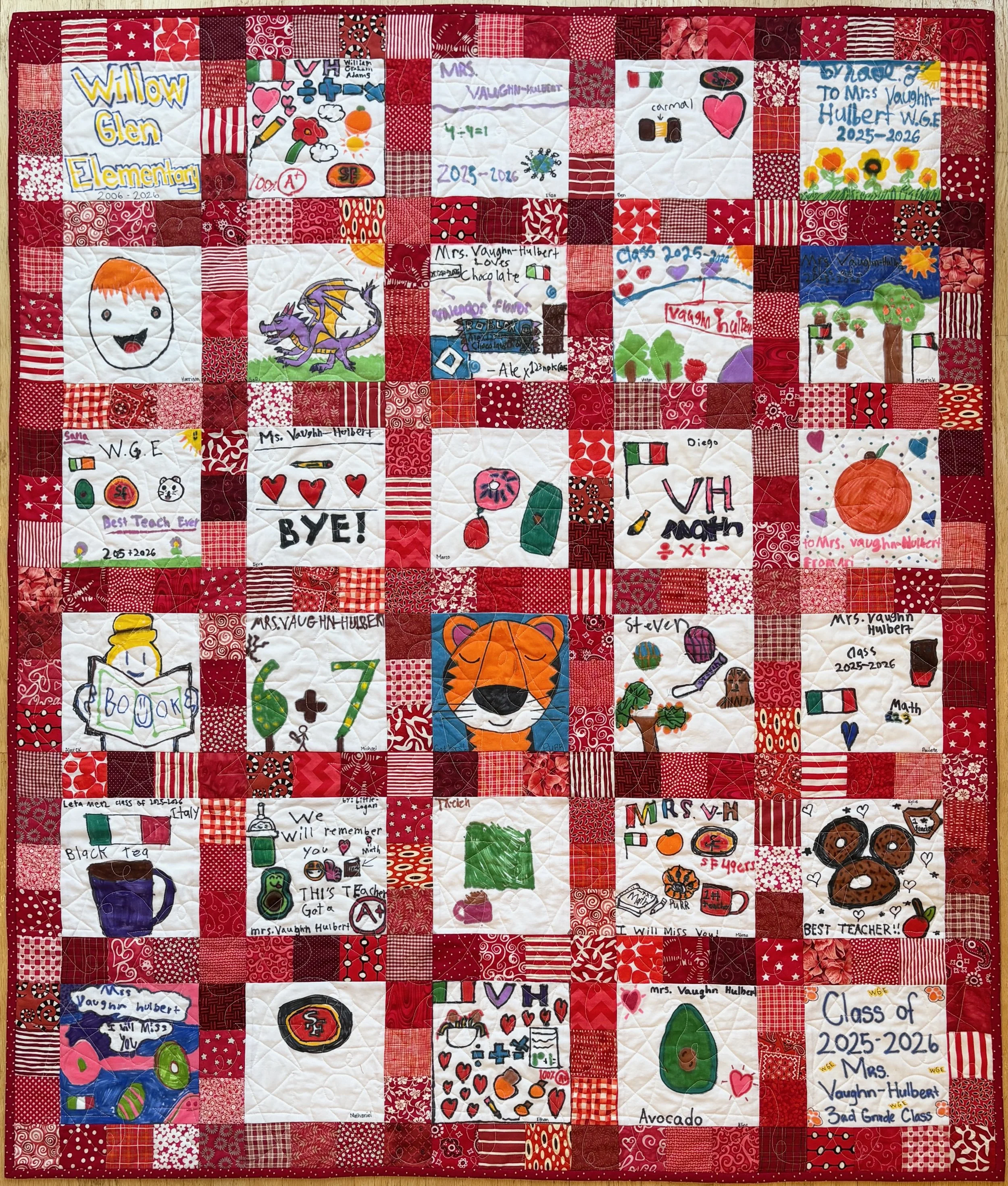 Quilt with all red surrounding squares