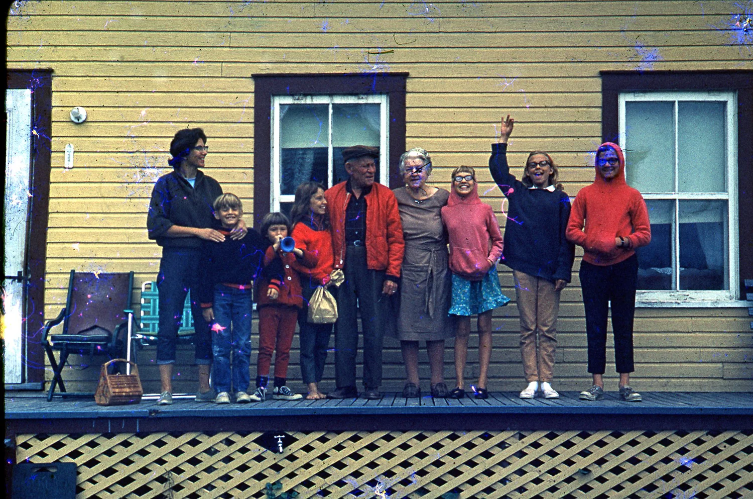 Here is the family (Dad was taking the picture)... from left to right, my Mom, George, Cathy, Mary, our friends, then Amy, me (with my arm up) and Nick. We had just come out of a fishing and camping trip deep in the woods. (When I say that I mean we had gone 200 miles on a dirt road, then another 10 miles by water, and then we cut a trail and portaged canoes another mile to another lake.) My Mom said we had to get to an actual house and so we came here to our friends, to an Indian Reservation in Northern Quebec. We did some fishing there as well. I think it was 1965.