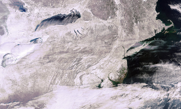North American Snowstorm. (You can see Block Island in this picture. Look to the east of the tip of Long Island for a tiny dot shaped like a pork chop. It's south and slightly west of the break in the Rhode Island coast that is Narraganset Bay. Cape Cod, Martha's Vineyard, and Nantucket are to the north and east of Block Island. This picture was taken in January, 2011. Look very carefully for a woman with two golden retrievers. I was probably out there taking pictures after the storm!)