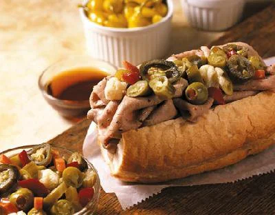 Italian Beef Party Pack 12 BIG Sandwiches or 24 1⁄2 Sandwiches - $79.99 3 Lbs of BobbyG’s famous Italian Beef. Includes Gonnella Bread, Juice and 1 quart each of Grilled Green Peppers in Garlic, Grilled Onions in Garlic and 8oz container of Hot and Mild Giardinera. We recommend 1⁄2 sandwiches for buffet applications.