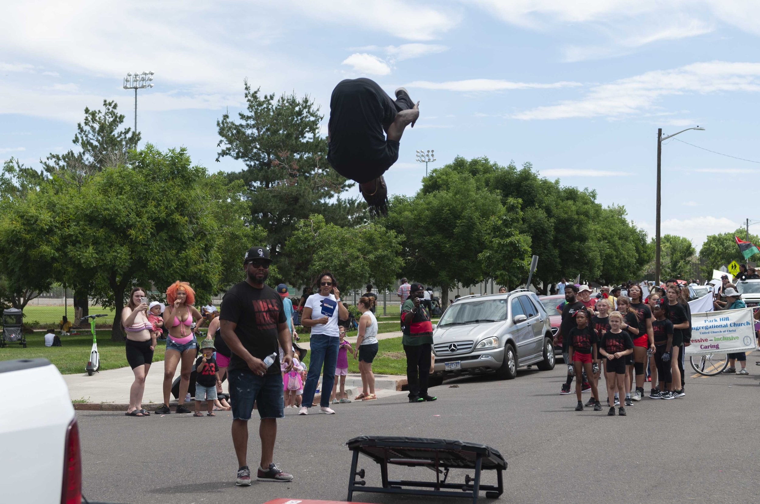  Members of ‘Mile High Tumblers 5280’ perform acrobatic flips during Denver’s   Juneteenth   celebration. 
