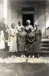 Fiftieth anniversary: Charlotte Hobbs and ladies on front steps.